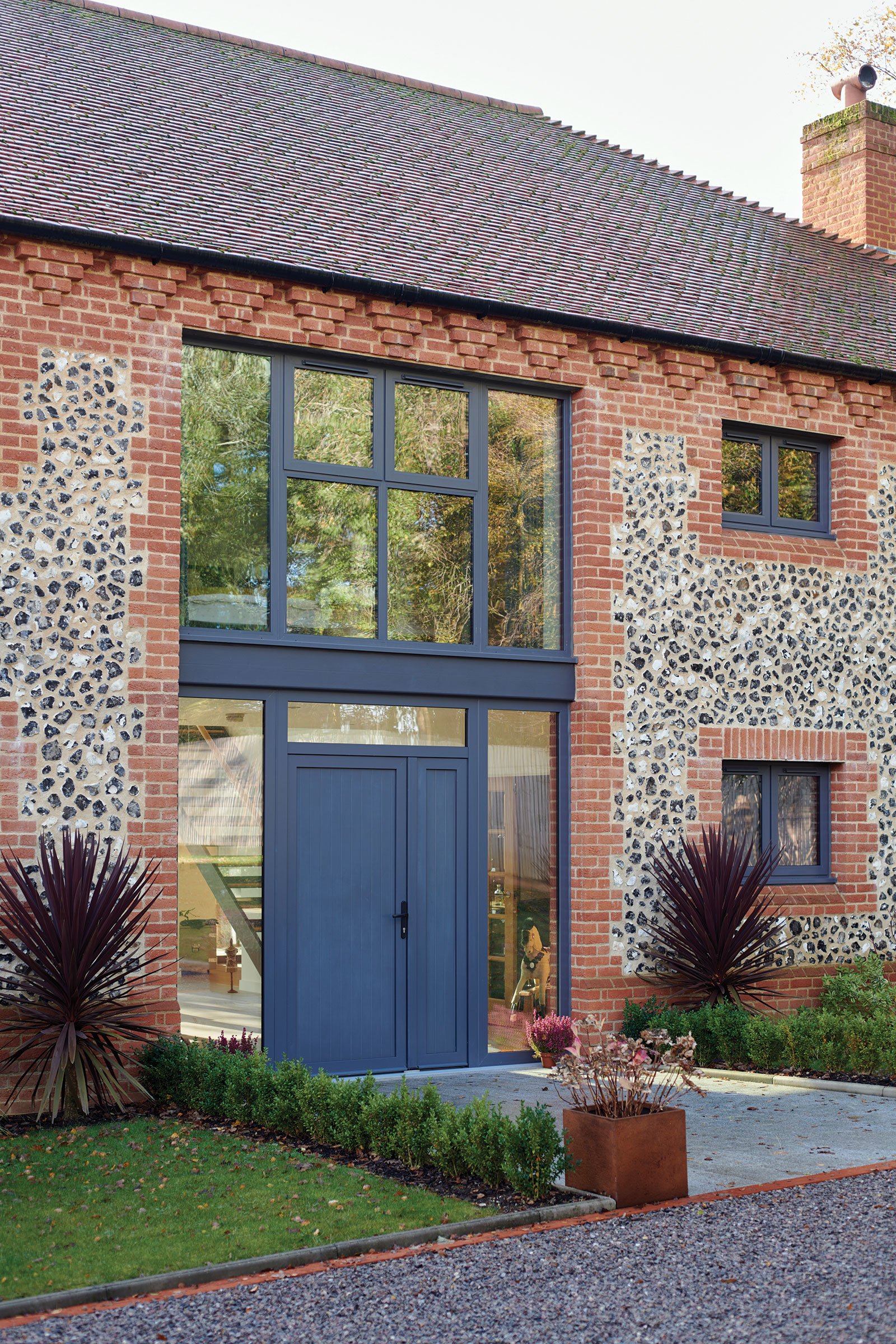self build with flint cladding