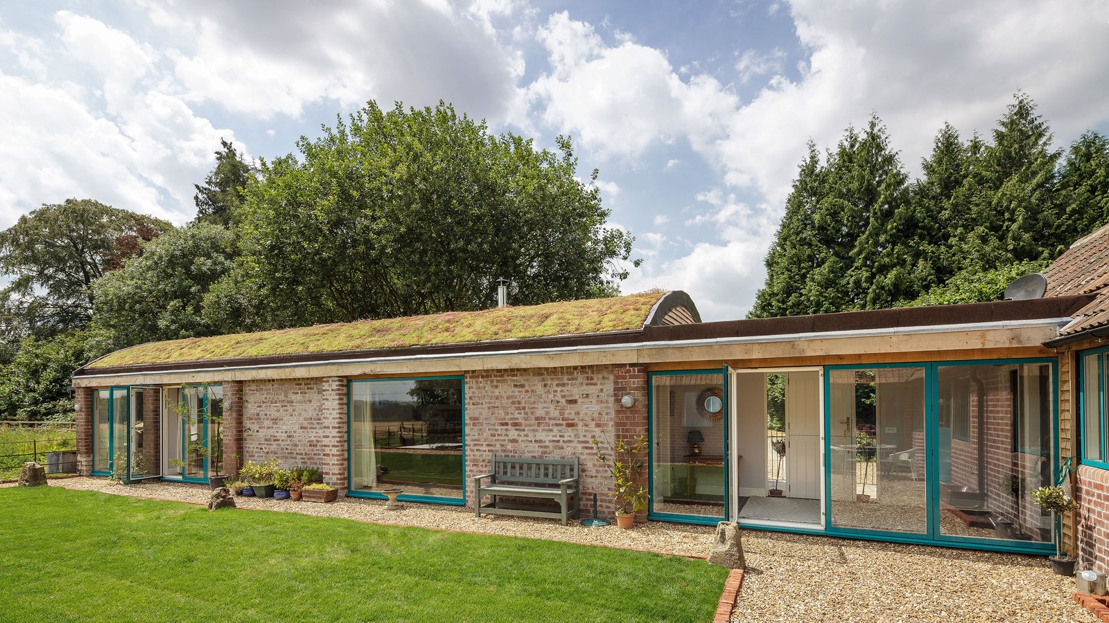 Eco home with curved green roof