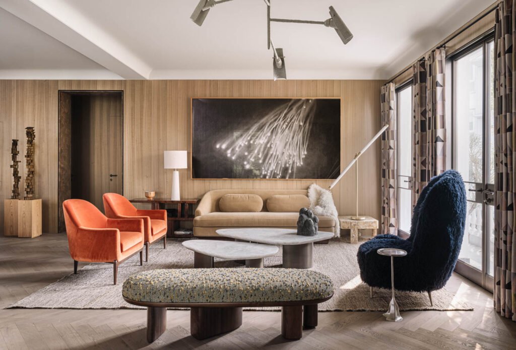 a natural-toned living room with pops of color