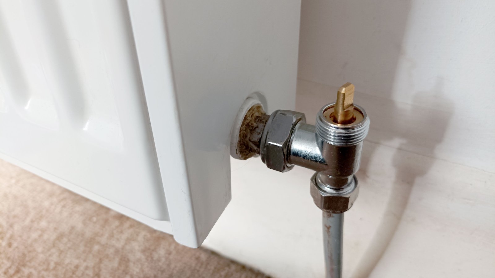 Close up of standard lockshield radiator valve without cap