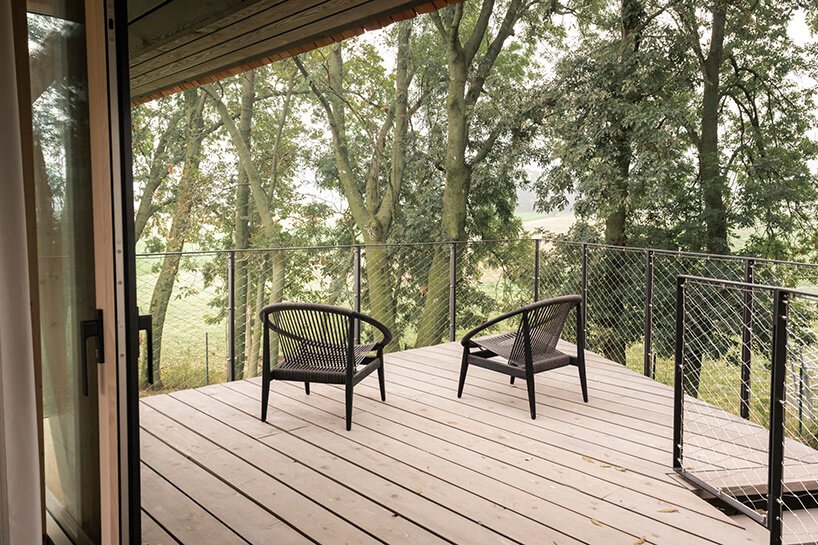 architect jan tyrpekl elevates this tiny 'zen house' on stilts in rural austria