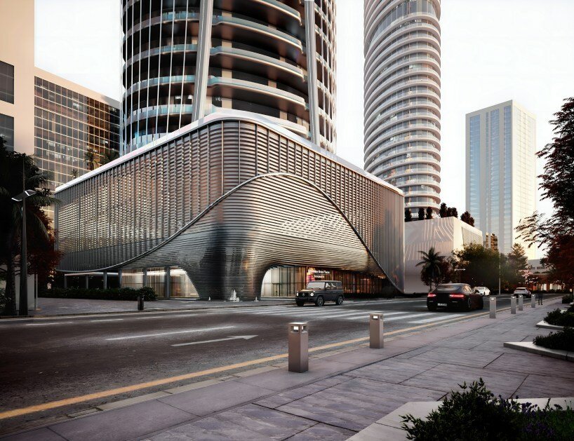 sinuous and futuristic, mercedes-benz places marks the german car company's first architectural landmark in dubai