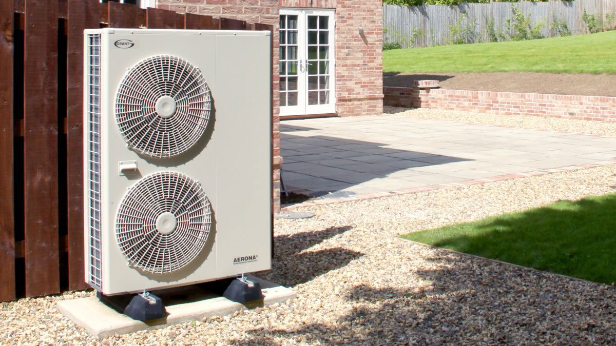 an air source heat pump outside of a house
