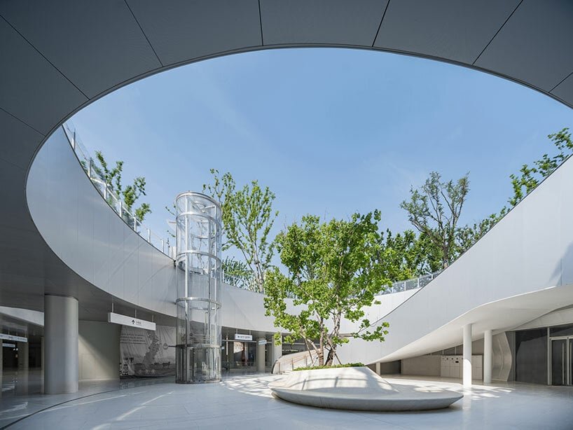 ma yansong on MAD's first transit-oriented project, a 'train station in the forest' in jiaxing