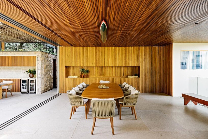 a modern treehouse by DB arquitetos rises from brazil's lush coastal canopies