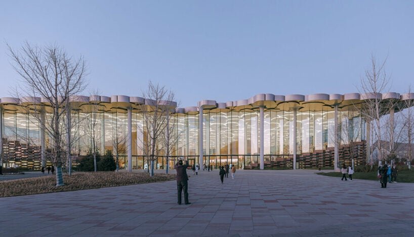 beijing city library by snøhetta opens to the public, revealing sculpted 'hills' and 'valleys'