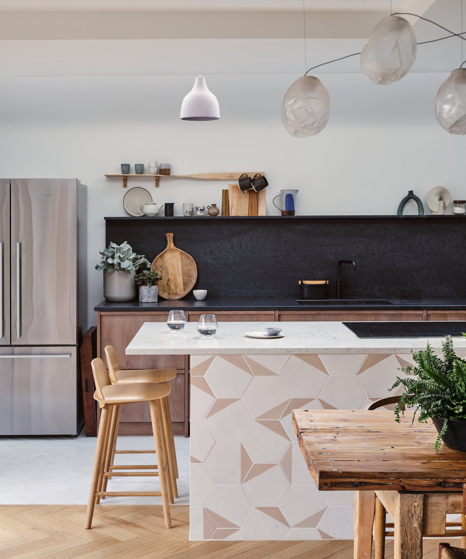 kitchen with wooden and white flooring in different areas