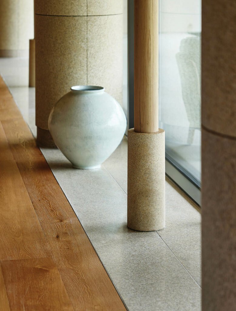 a cream ceramic vase