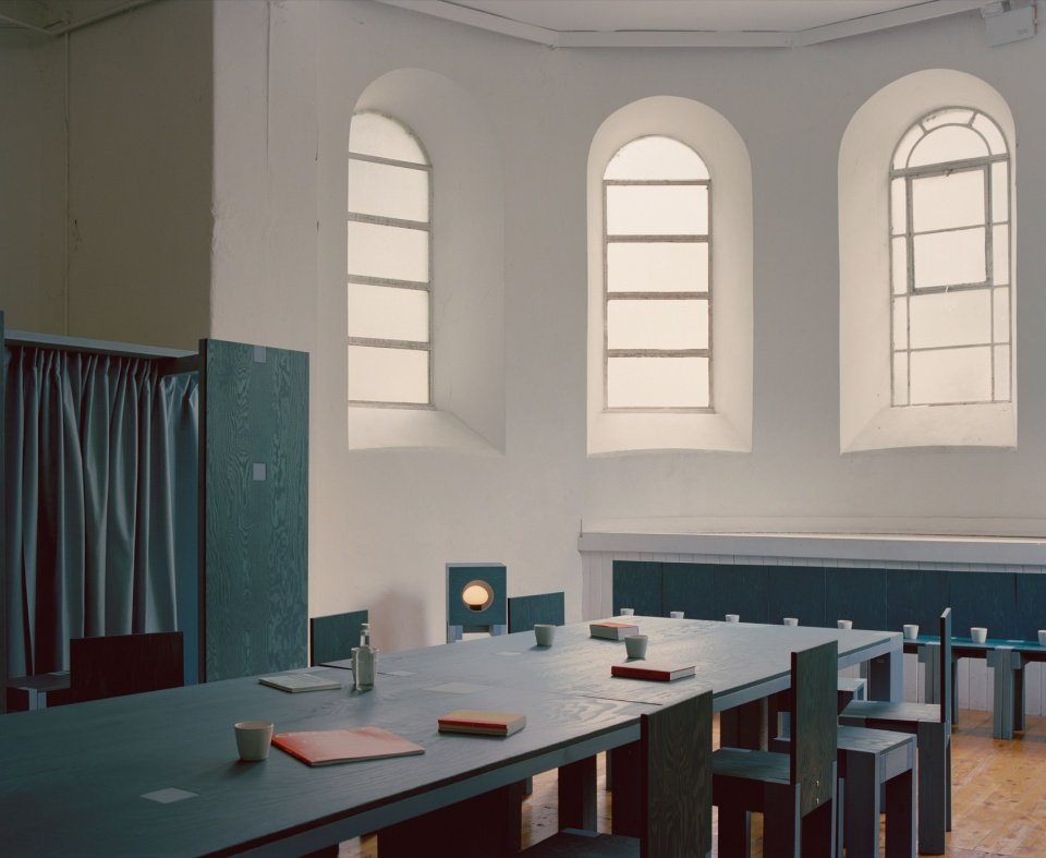 Furniture arrangement beside the windows