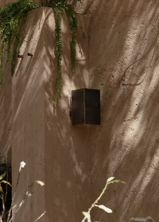 tree shadows and a wall light on the rendered surface
