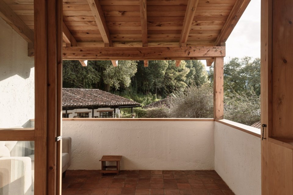 upper-floor terrace overlooking the trees