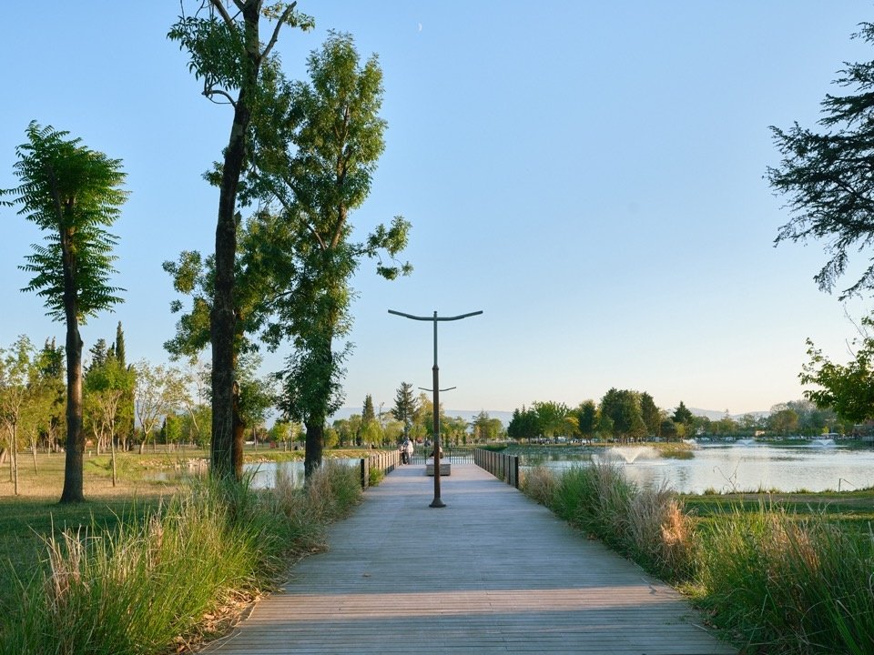 Path between the lakeside and greenery/Path between the lakeside and greenery