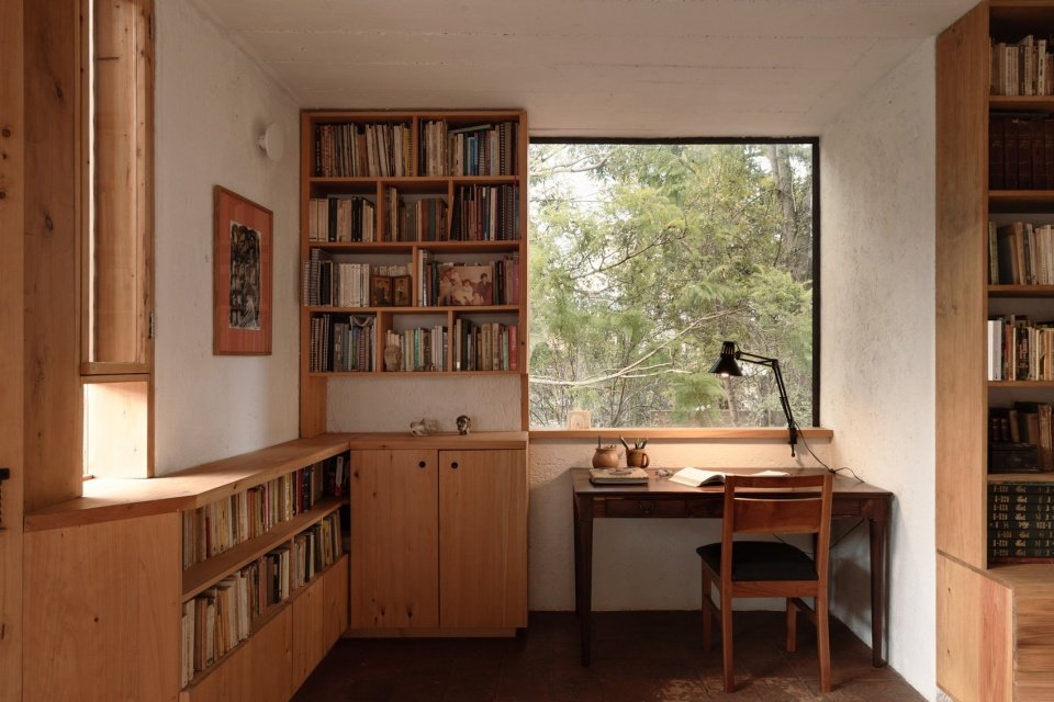 a reading and working corner facing greenery, a reading and working corner facing greenery