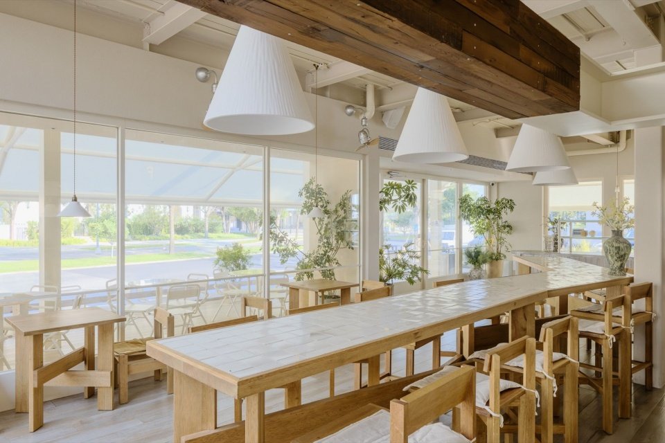 Shared long table and wooden ceiling area