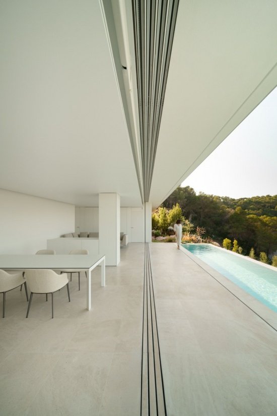 Interior and poolside terrace/ Interior and poolside terrace