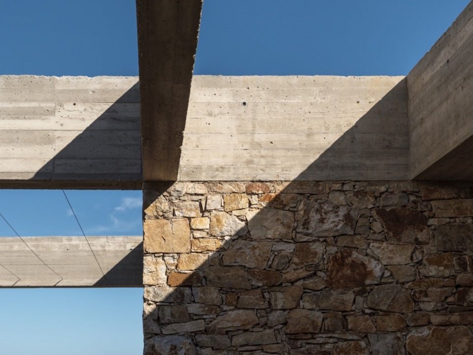 Junction between stone and concrete