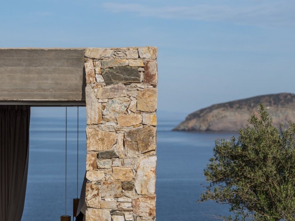 Sea view through a stone-wall opening