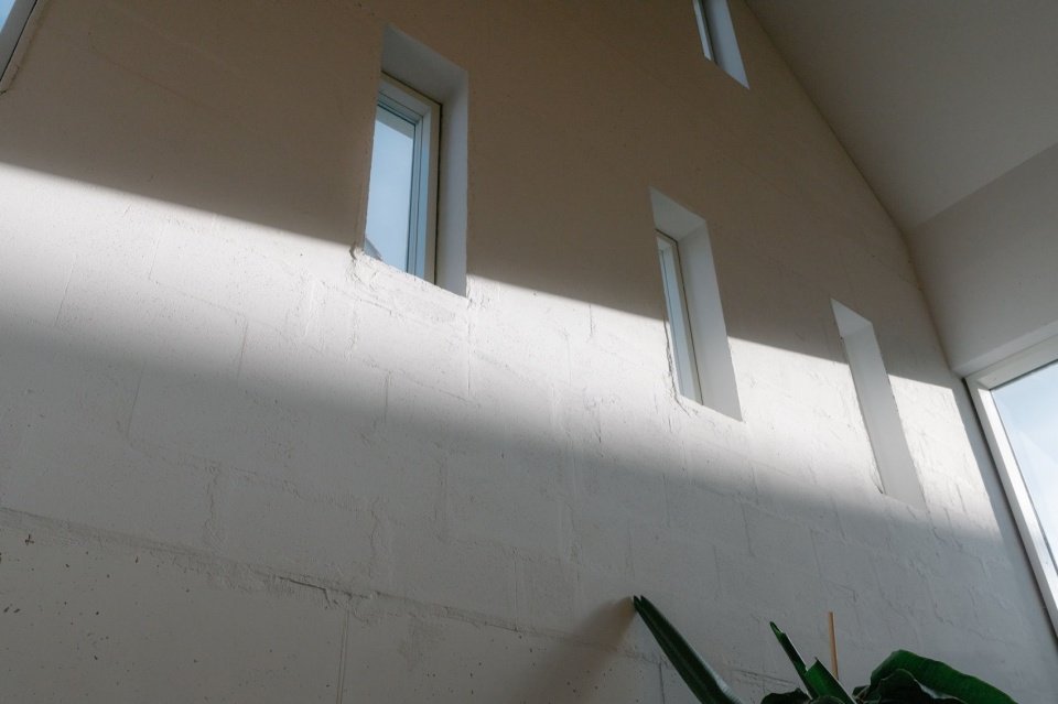 High-level openings cast shifting light