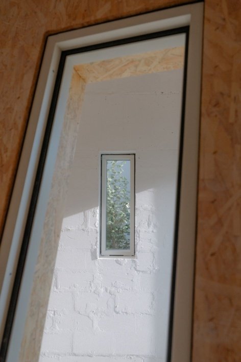 Connection across floors through an open internal window