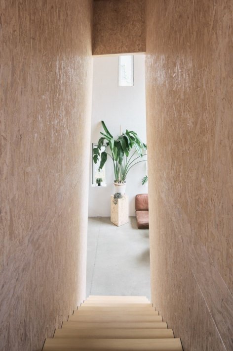 View from a private room toward the shared space